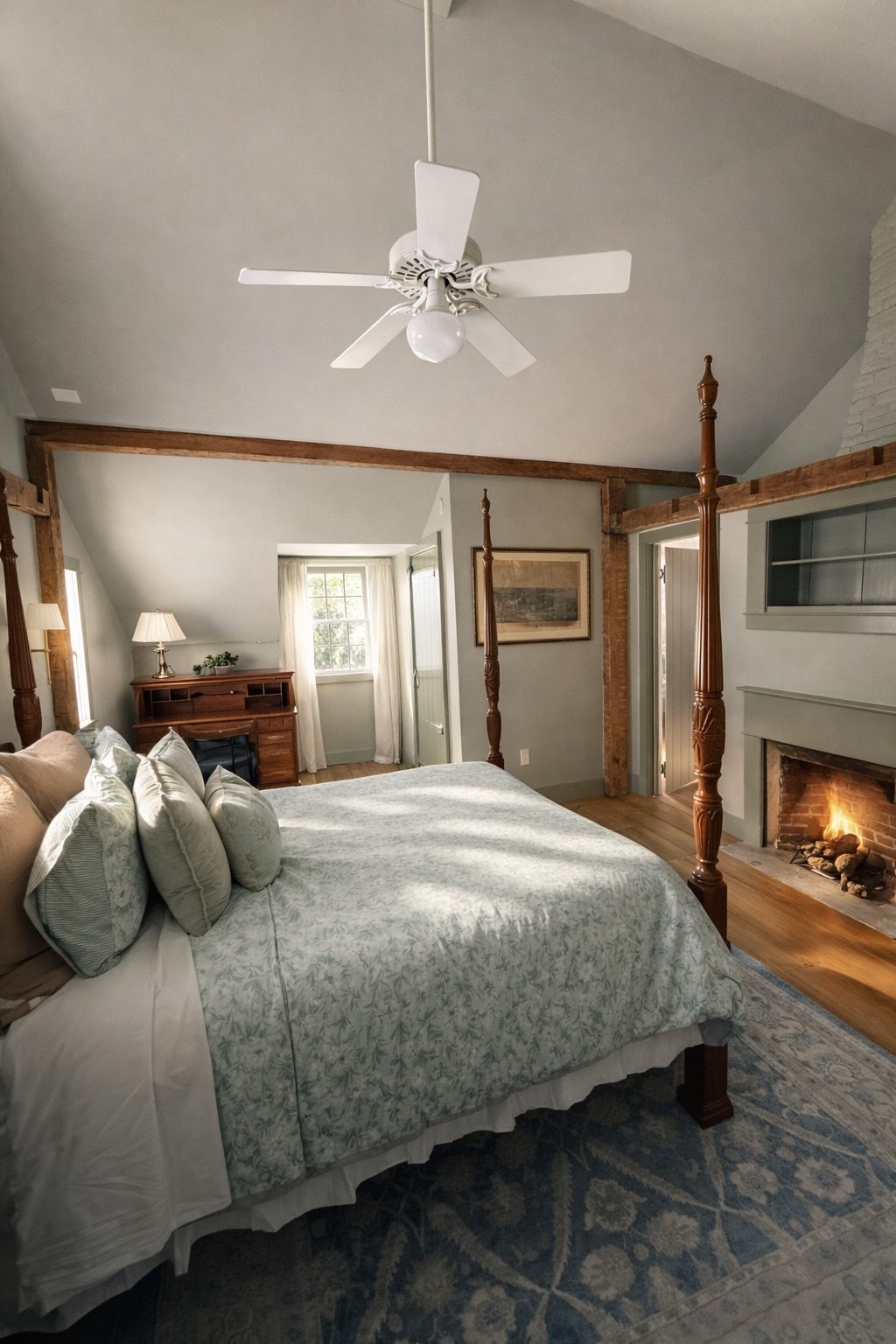 Four poster bedroom with a wood burning fireplace, winter ski stay near Thunder Ridge