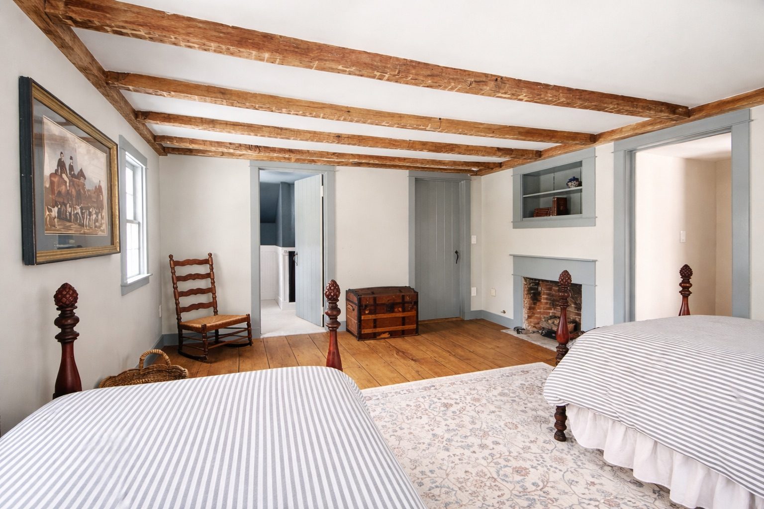 Twin bedroom with antique beds and fireplace, sleeps two